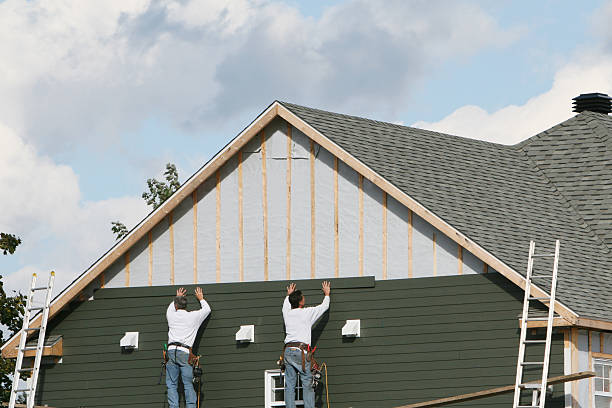 Professional Emergency Siding Repair technician working in Bellaire, OH